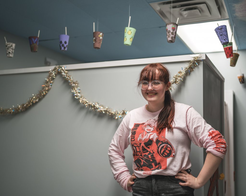 picture of nikki and her dangling hand painted boba cups